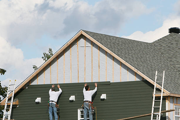 Professional Siding Replacement technician working in Troy, PA